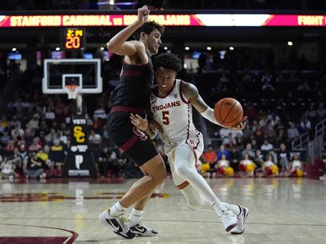 USC defeats Stanford 93-79 with 3 Trojans topping 20 points in front of LeBron James